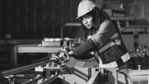 Lady in a trade working in workshop